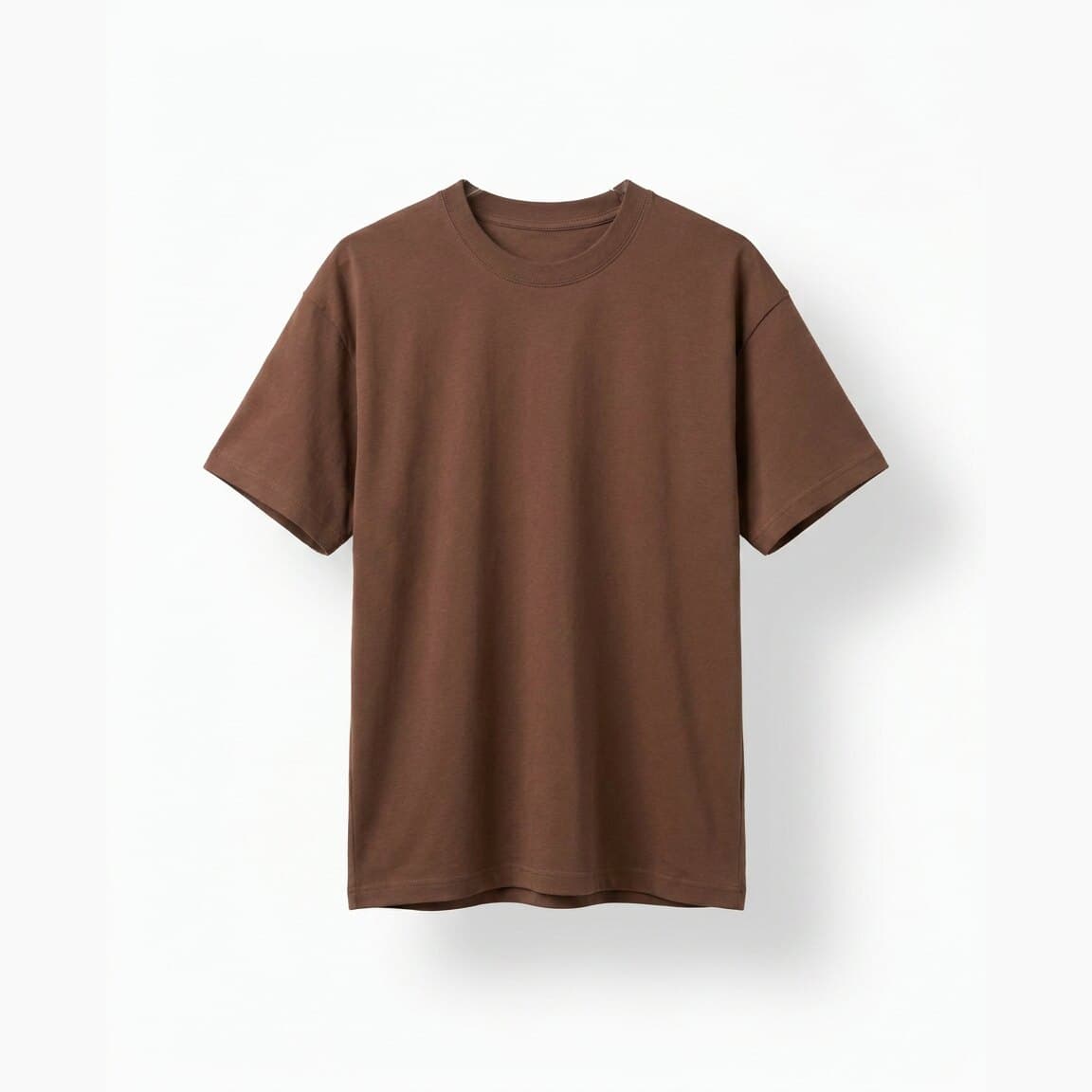 Invisible hanger packshot of a t-shirt hanging on a white background with the hanger removed