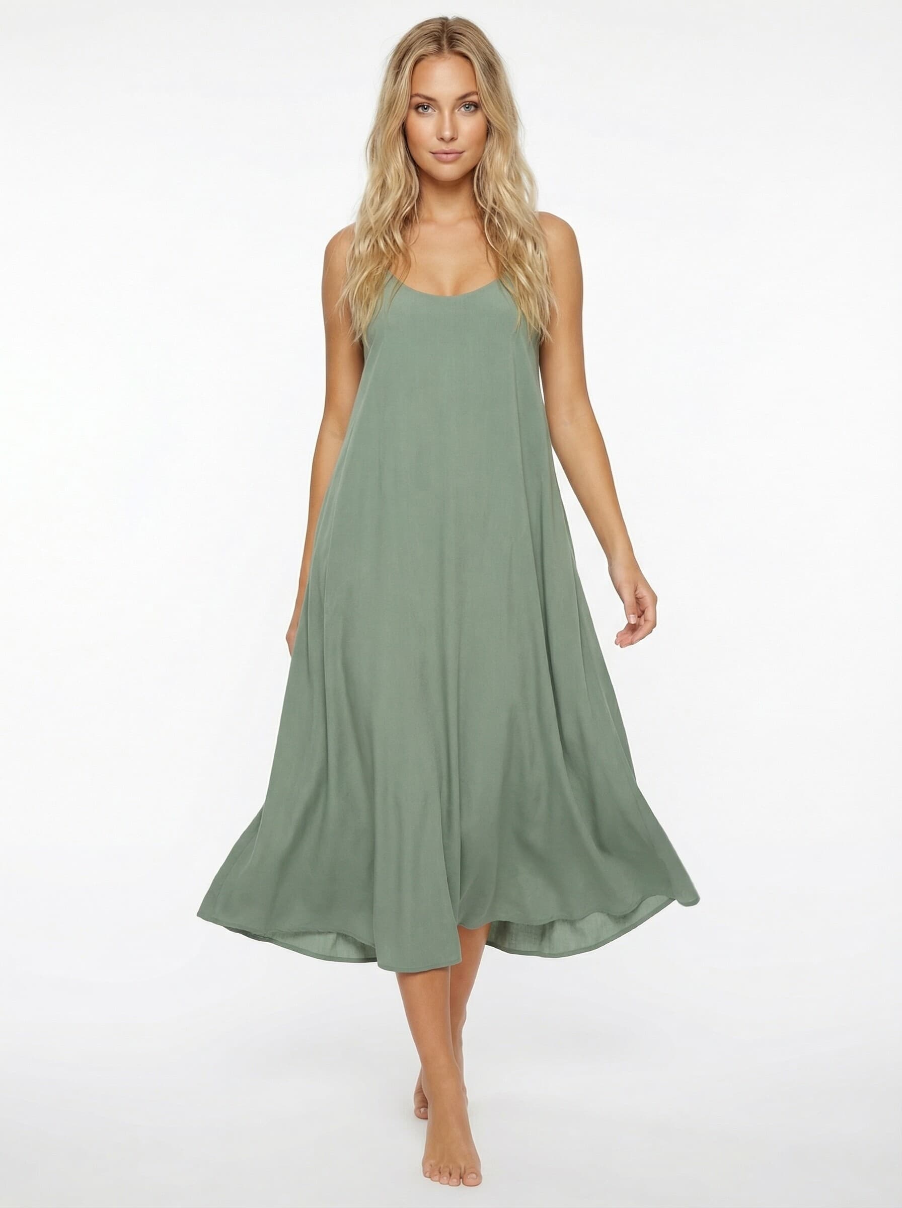 AI-generated on-model photo - sage green summer midi dress on model Kaia, flowing silhouette from mannequin input