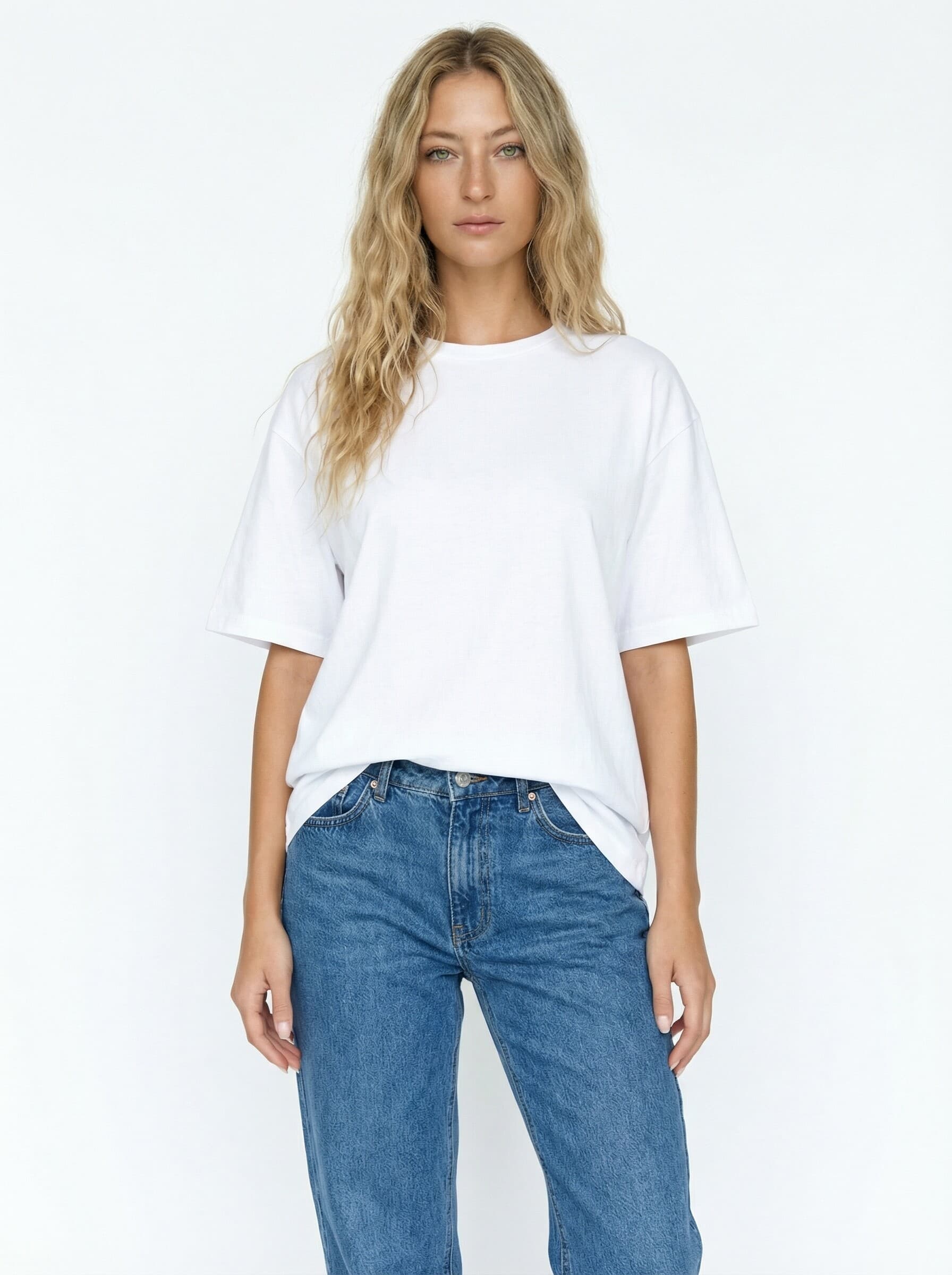 AI-generated on-model photo - white t-shirt and denim jeans on model Diana, studio-quality result from flat-lay input